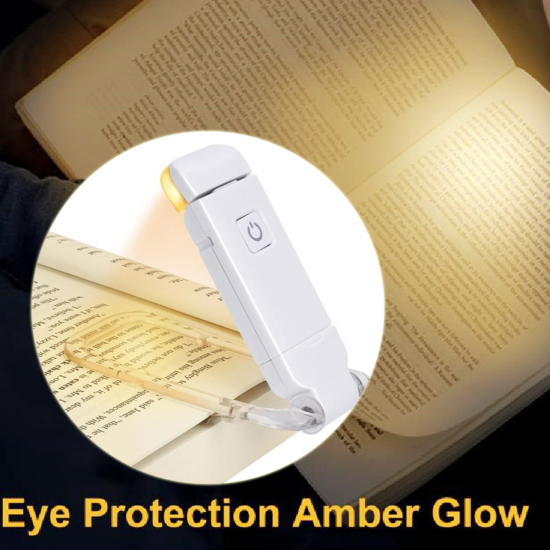 Clip holding the light on the book